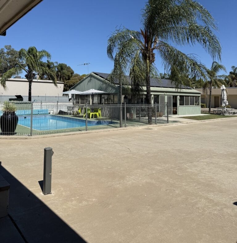 Home - Outdoor swimming pool at MIA Motel